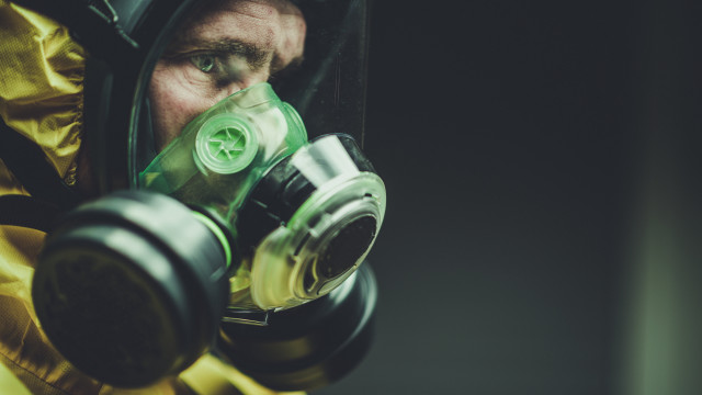 Gas mask yellow jacket green free wallpaper for desktop - medium preview image