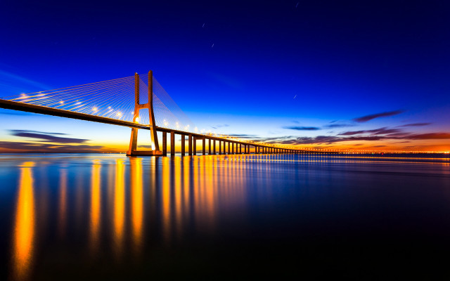 Long bridge sunset water reflection free wallpaper for desktop - medium preview image