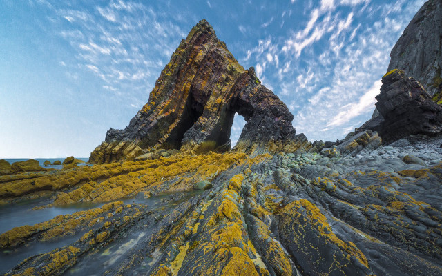 Mossy rock bridge lake sky free wallpaper for desktop - medium preview image