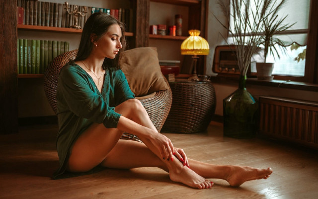 Woman sitting crossed feet indoor free wallpaper for desktop - medium preview image