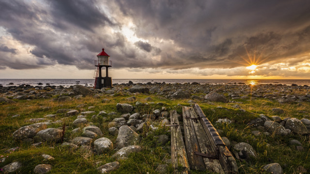 Lighthouse rocky shore cloudy sky #2 free wallpaper for desktop - medium preview image
