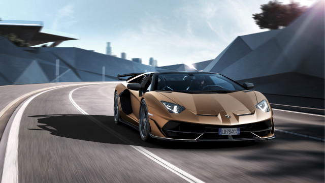 Gold sports car road sky free wallpaper for desktop - medium preview image
