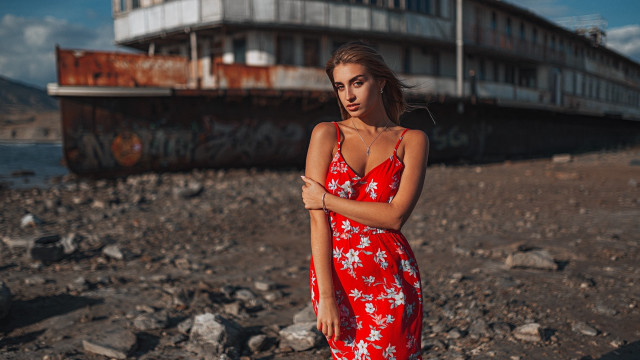 Woman red dress rocky beach free wallpaper for desktop - medium preview image