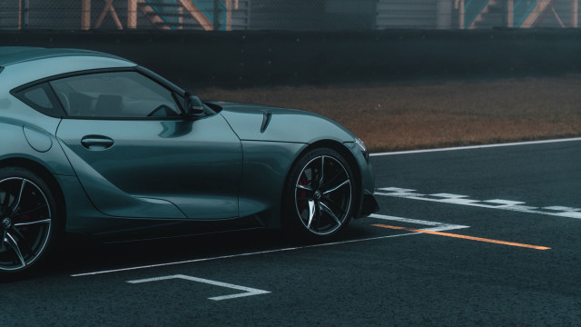 Blue sports car road building free wallpaper for desktop - medium preview image