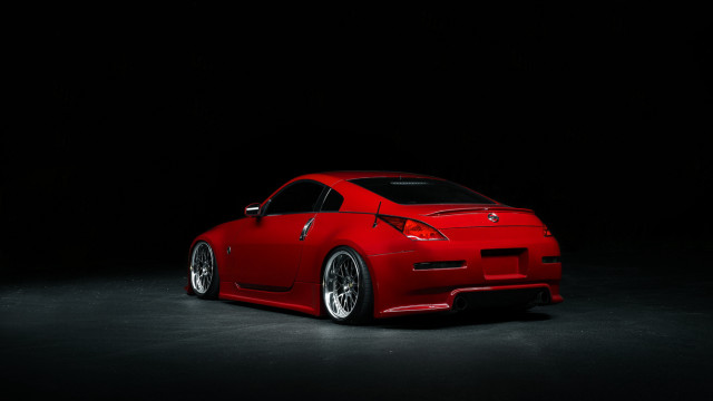 Red sports car dark room #25 free wallpaper for desktop - medium preview image