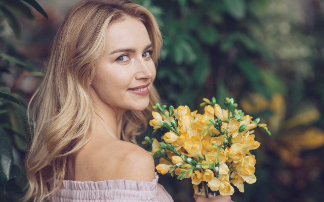 Woman yellow flowers smiling outdoors free wallpaper for desktop - medium preview image