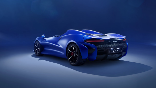 Blue sports car spotlight black free wallpaper for desktop - medium preview image