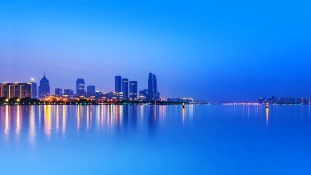 City skyline reflection night blue free wallpaper for desktop - medium preview image