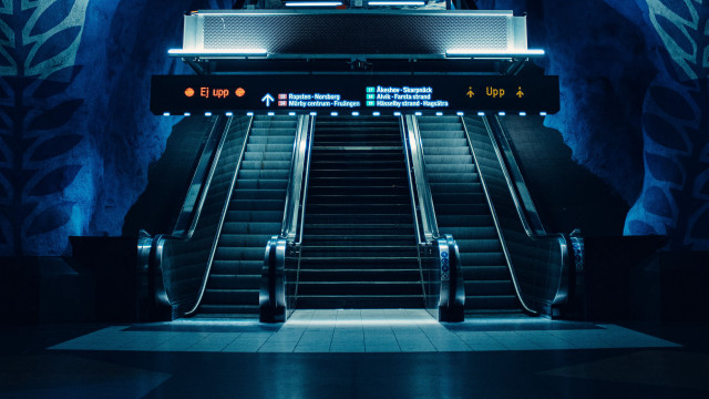 Futuristic escalator blue wall clock free wallpaper for desktop - medium preview image