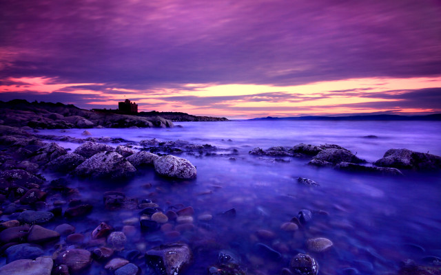 Purple sky lighthouse rocky beach free wallpaper for desktop - medium preview image