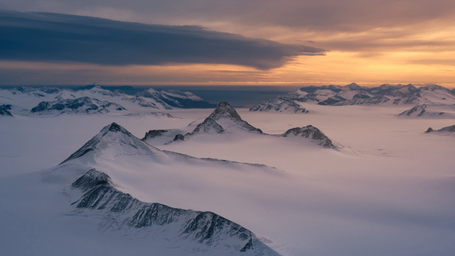 Snowy mountains cloudy sunset landscape free wallpaper for desktop - medium preview image