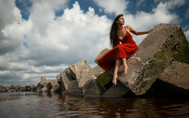 Woman red dress sitting rock #4 free wallpaper for desktop - medium preview image