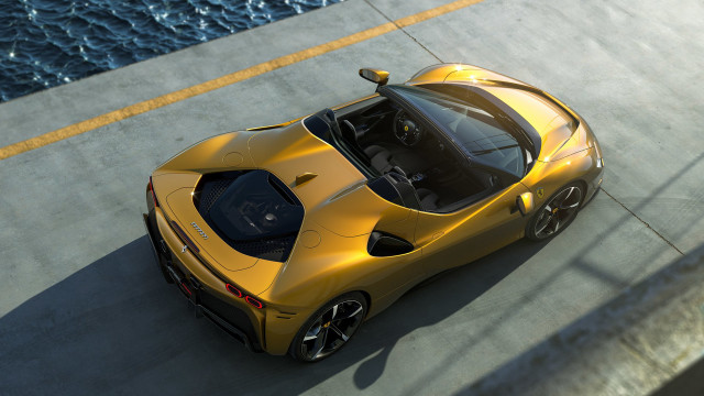 Yellow sports car water road free wallpaper for desktop - medium preview image