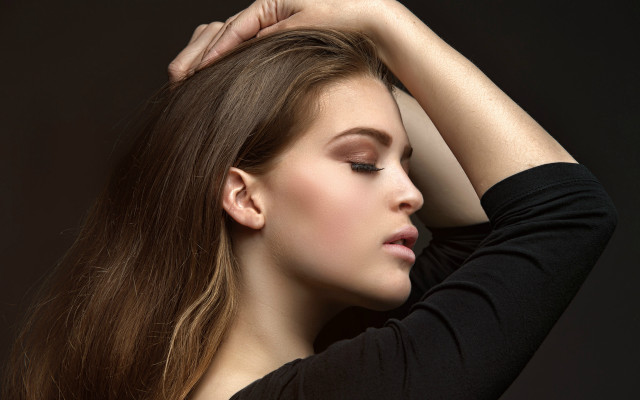 Woman long hair touching head free wallpaper for desktop - medium preview image