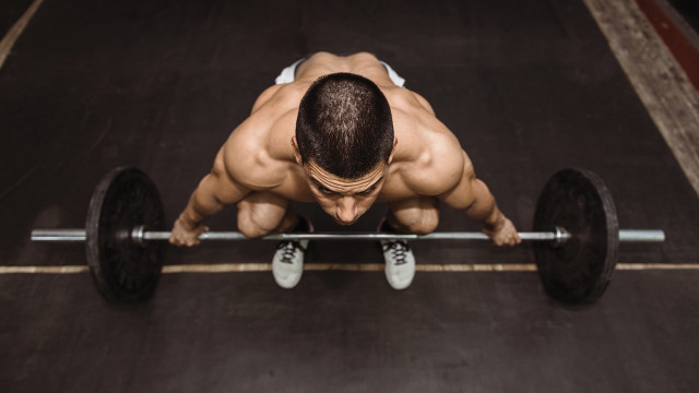 Man pushup barbell gym blackfloor free wallpaper for desktop - medium preview image
