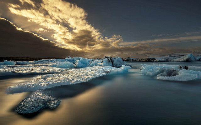 Icebergs water cloudy sky sunset free wallpaper for desktop - medium preview image