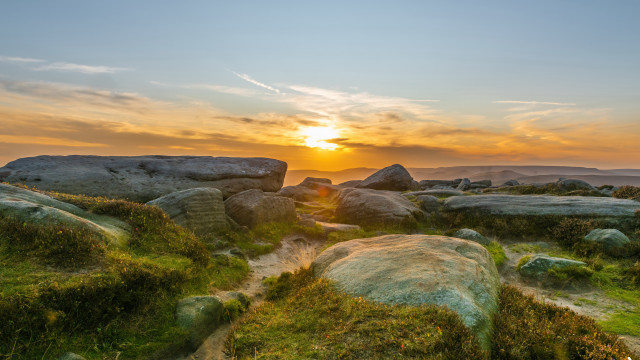 Sunset rocky landscape grass rocks free wallpaper for desktop - medium preview image