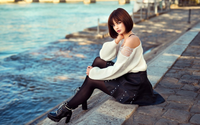 Woman sitting water white sweater free wallpaper for desktop - medium preview image
