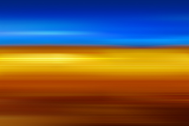 Blurry blue yellow sky plane free wallpaper for desktop - medium preview image
