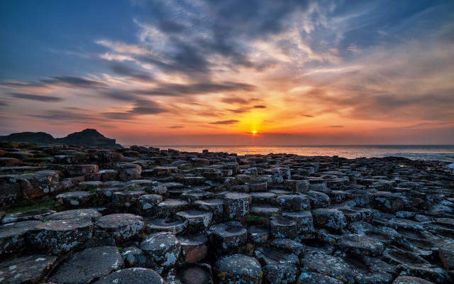 Sunset rocky beach cityscape water #2 free wallpaper for desktop - medium preview image