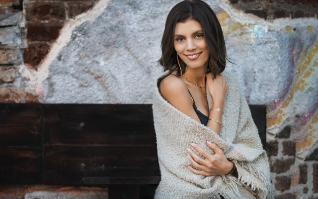 Woman blanket bench brickwall painting free wallpaper for desktop - medium preview image