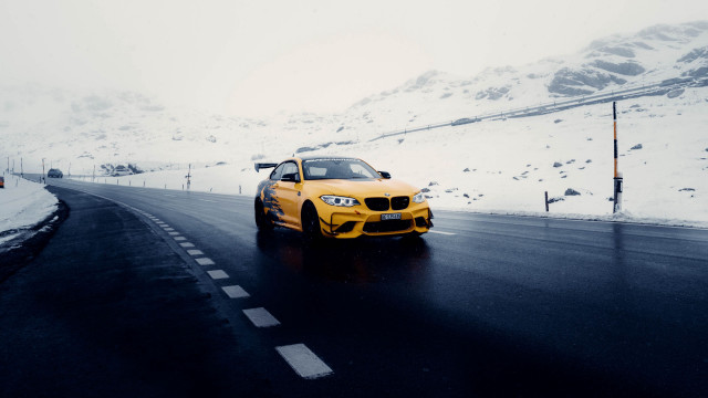 Yellow car snowy mountain europe free wallpaper for desktop - medium preview image
