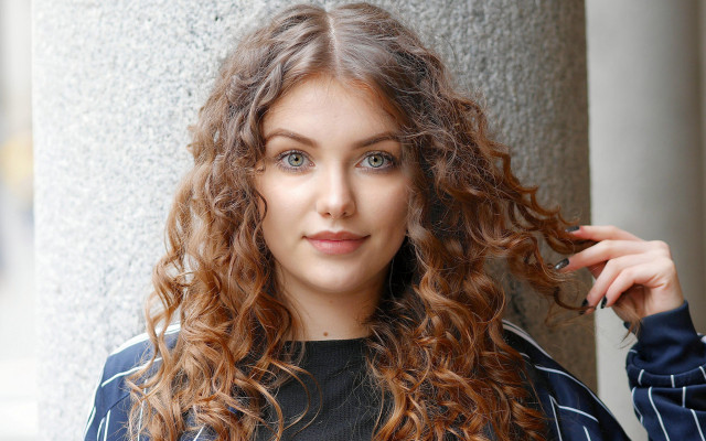 Woman curly hair posing freckles free wallpaper for desktop - medium preview image