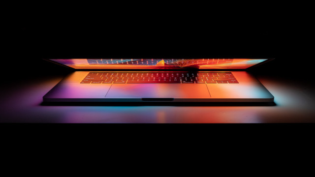 Laptop colorful keyboard reflection sunset free wallpaper for desktop - medium preview image