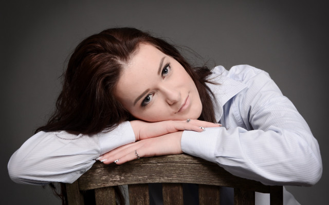 Woman sitting portrait brown hair #2 free wallpaper for desktop - medium preview image