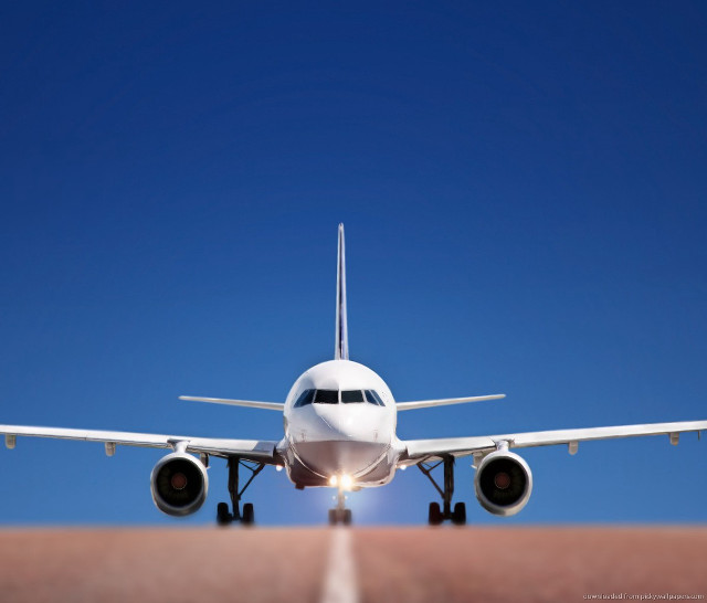 Jetliner flying blue sky runway #5 free wallpaper for desktop - medium preview image