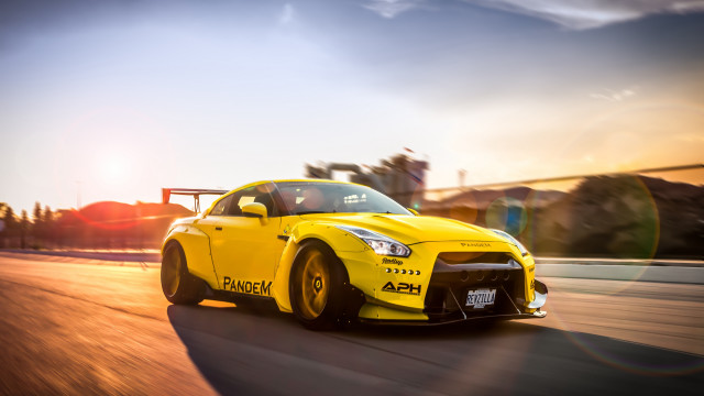 Yellow sports car sunset road #3 free wallpaper for desktop - medium preview image