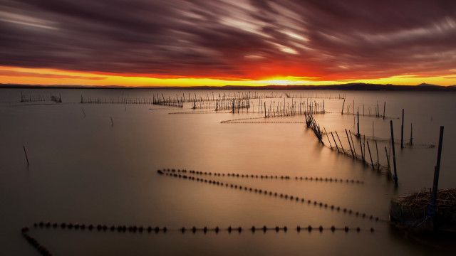 Poles sunset ocean clouds hourglass free wallpaper for desktop - medium preview image