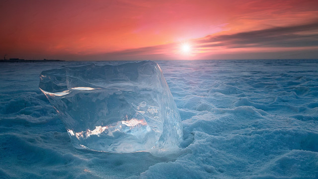 Ice sculpture sunset mountains ocean free wallpaper for desktop - medium preview image
