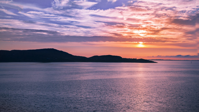 Sunset water mountain clouds cityscape free wallpaper for desktop - medium preview image