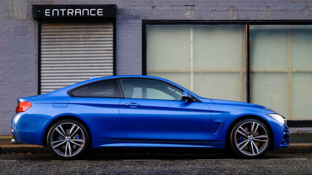 Blue car building entrance photorealism free wallpaper for desktop - medium preview image