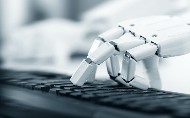 Robotic hand keyboard cybernetics blurry free wallpaper for desktop - medium preview image