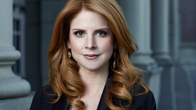 Red haired woman serious portrait free wallpaper for desktop - medium preview image