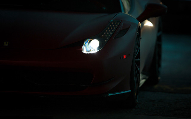 Red sports car headlights on free wallpaper for desktop - medium preview image