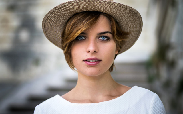 Woman hat serious blue eyes free wallpaper for desktop - medium preview image