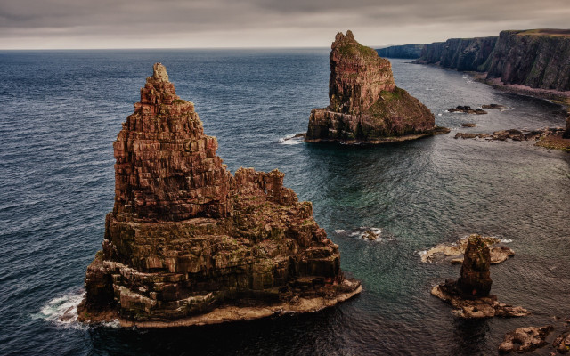 Ocean rocks waterfall mountain city free wallpaper for desktop - medium preview image