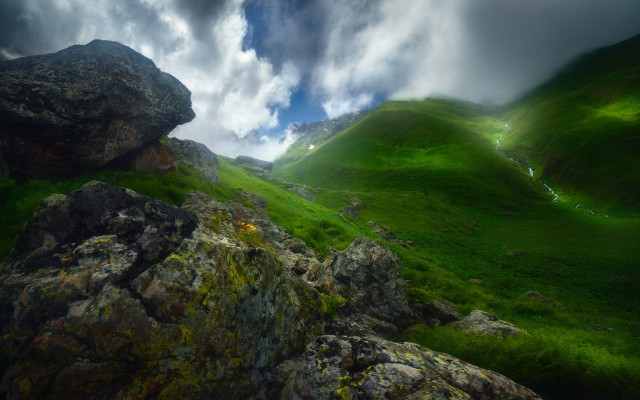 Green mountain rock formation cloudy free wallpaper for desktop - medium preview image
