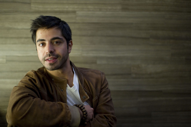 Man brown jacket posing arms free wallpaper for desktop - medium preview image