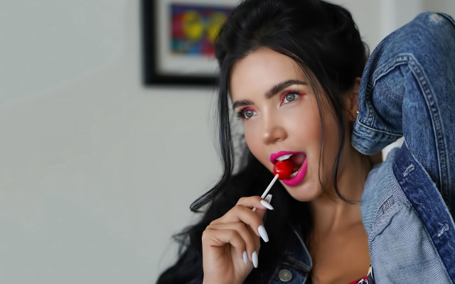 Woman denim jacket lollipop smile free wallpaper for desktop - medium preview image