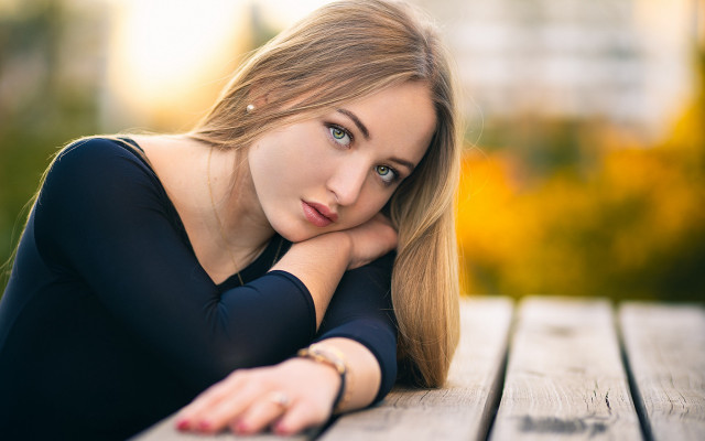 Woman longhair bench portrait blurry free wallpaper for desktop - medium preview image