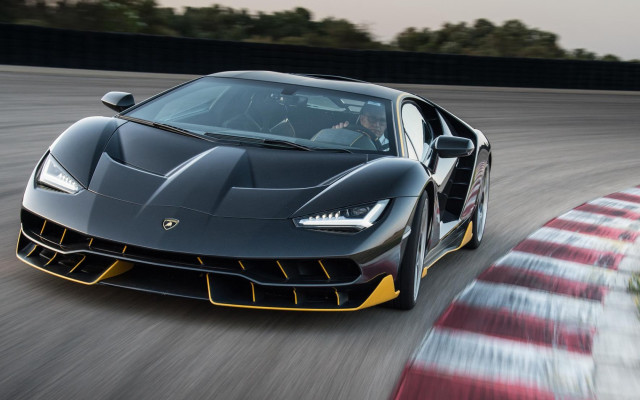 Black yellow sports car driving free wallpaper for desktop - medium preview image