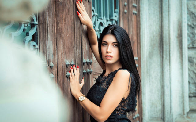 Woman black dress door handing free wallpaper for desktop - medium preview image