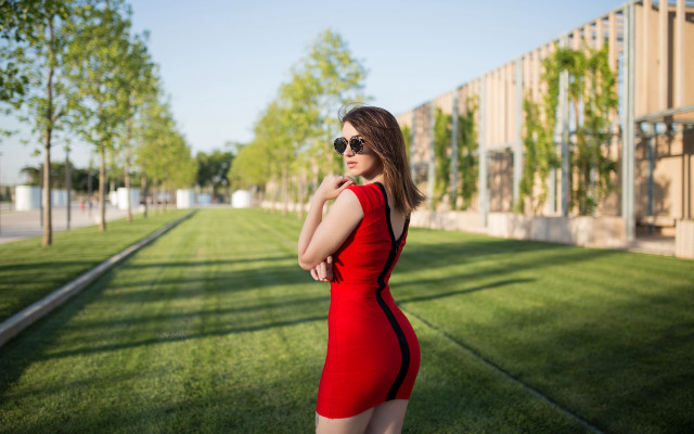 Red dress woman park cityscape free wallpaper for desktop - medium preview image
