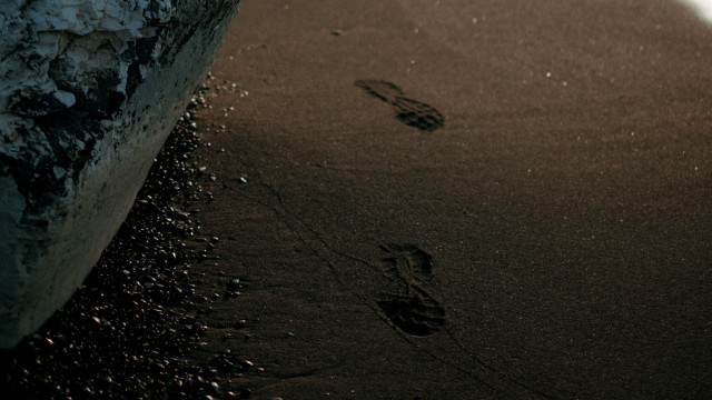 Beach walking rock surfboard footprints free wallpaper for desktop - medium preview image