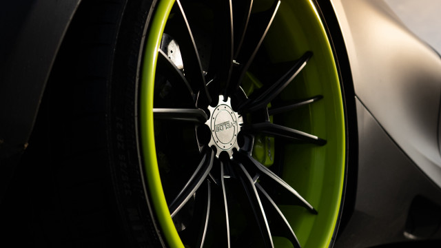 Car wheel green rim spokes free wallpaper for desktop - medium preview image