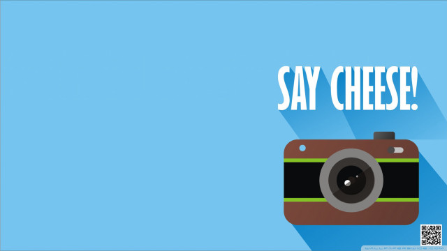 Camera say cheese blue background free wallpaper for desktop - medium preview image